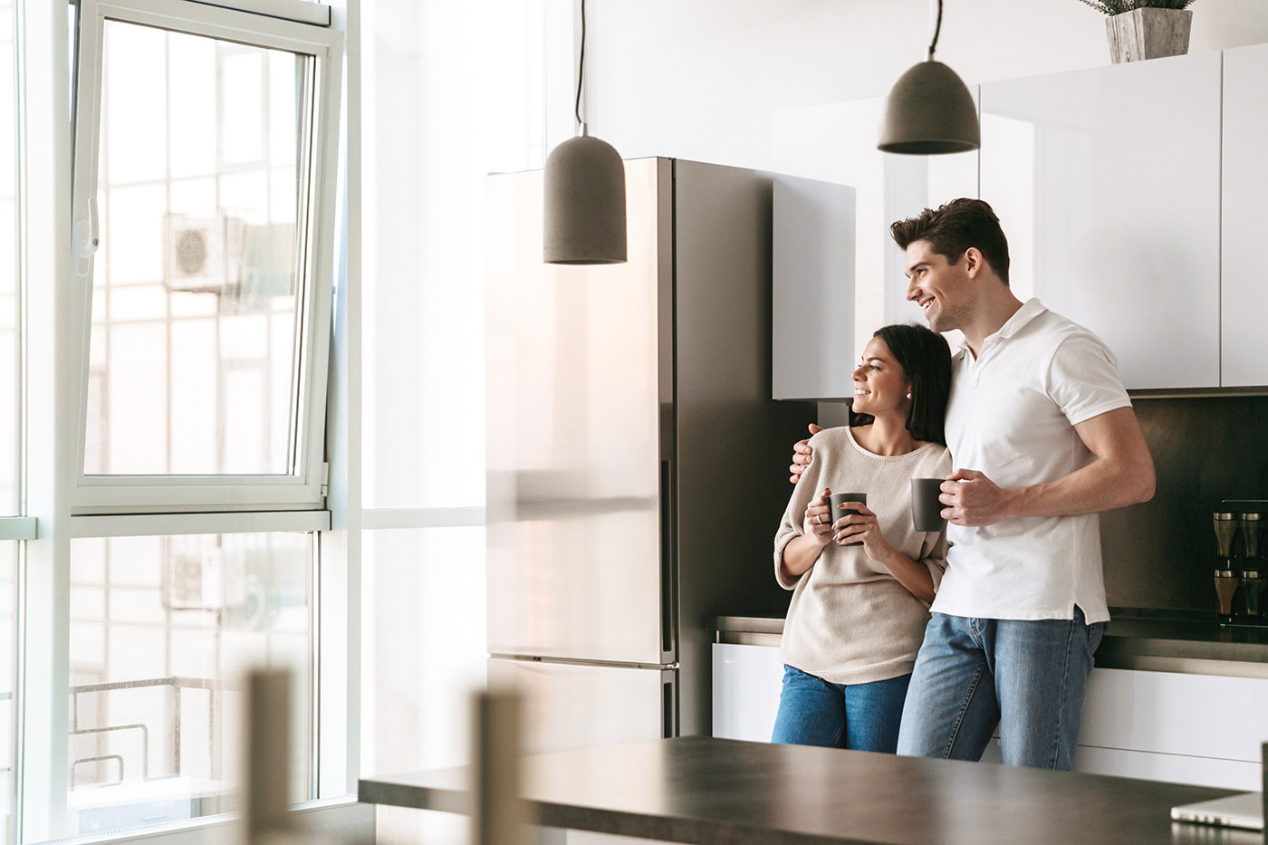 A couple enjoying the energy efficiency in their home - installation services provided by Solar Energy Partners in Charleston / Mt. Pleasant.